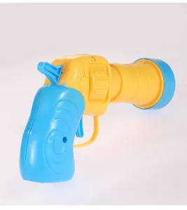 Detailed view of a blue and yellow plastic cat toy plush ball launcher gun.