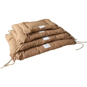 Thickened pet cushion with ties and tag, soft and comfortable for dogs and cats, khaki color.