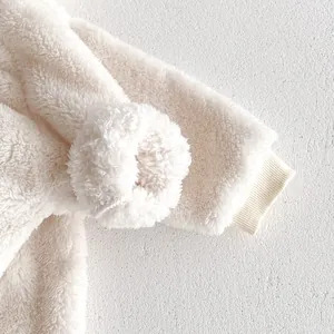 Soft fleece baby winter warm romper detailed close up view fluffy fabric cute style