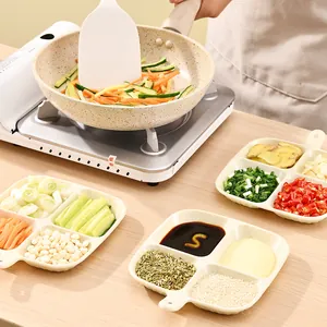 Multi-purpose four-grid kitchen prep tray for spices and vegetables in a home setting.
