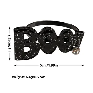 Halloween black glitter BOO letter napkin ring, creative table decor for holiday parties.