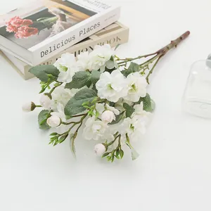 Artificial white rose flower bouquet for home living room decor and wedding party styling.