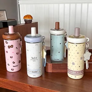 Stylish insulated stainless steel straw water bottles in pastel colors for girls.