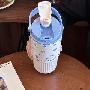 Gobelet isotherme en acier inoxydable avec motif d'étoiles et couvercle double