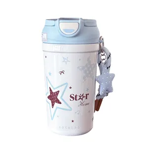 Insulated stainless steel coffee cup with blue star patterns and dual-drinking lid