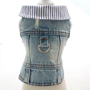Macro view of distressed dog denim vest featuring a sturdy leash D-ring and collar.