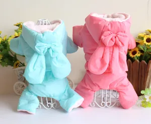 Cute pet winter coats in pink and blue featuring bunny ear hoods and decorative bows