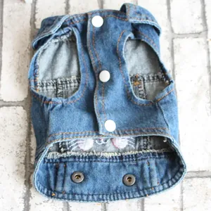 Blue denim pet vest featuring cute bunny embroidery and convenient white snap buttons.
