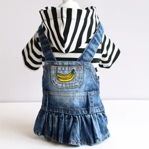 Back detail of pet dog denim dress with black and white stripes and banana embroidery