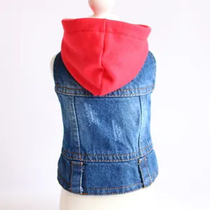 Detailed back view of a pet denim vest featuring a vibrant red knit hood for small dogs
