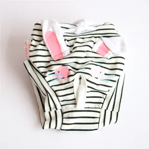 Detail view of striped dog physiological pants with pink rabbit ears and tail hole