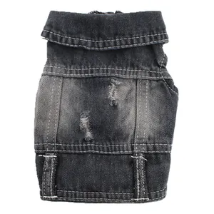 Detailed view of black distressed denim pet vest featuring ripped textures and wash finish