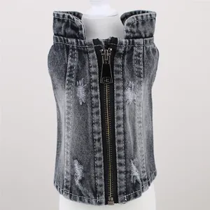 Detail shot of pet dog denim vest featuring ripped distressed accents and front zipper