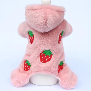 Detail of pink thickened fleece dog pajamas with cute strawberry embroidery patterns
