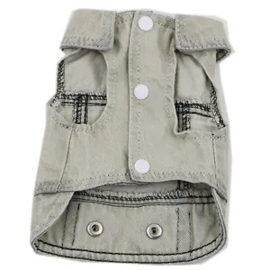 Detail view of light beige pet denim vest with snap button closure for small dogs