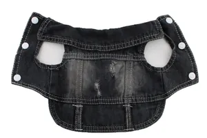 Detailed view of a black distressed denim pet vest with white snap buttons