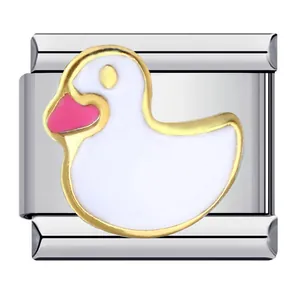 Detailed macro view of an Italian charm featuring a white duck with gold trim.