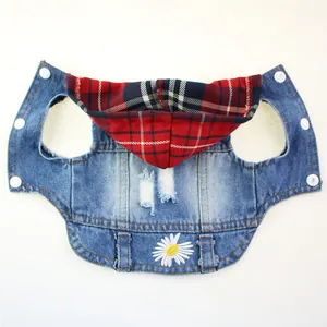 Denim pet vest with red plaid hood, white daisy embroidery and distressed hole details.