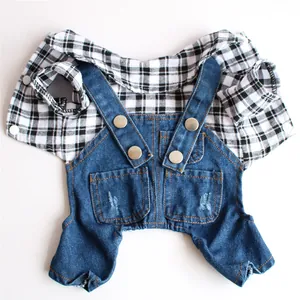 Detailed view of fashionable pet plaid shirt and denim overalls jumpsuit for small dogs