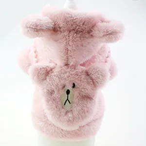 Detail view of pink plush dog hoodie with cute embroidered bear face.