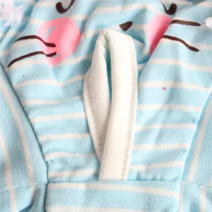 Macro detail of tail hole and fabric on blue striped female dog physiological pants