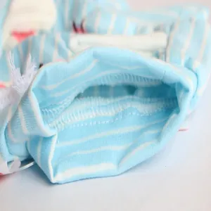 Close-up detail of blue and white striped pet physiological pants with elastic waistband