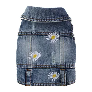 Detailed view of the daisy embroidered distressed denim pet vest for dogs and cats