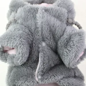 Detail showing soft grey plush texture and pink lining of pet winter coat