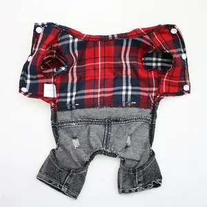 Detail view of plaid pet jumpsuit with distressed denim bottoms and snap buttons