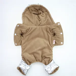 Close-up of soft brown fleece lining on silver metallic four-legged pet winter jacket