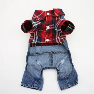 Detailed view of a stylish red plaid and denim dog jumpsuit with classic snap buttons.