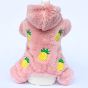 Detailed view of pink plush dog hoodie with cute embroidered pineapple patterns for winter