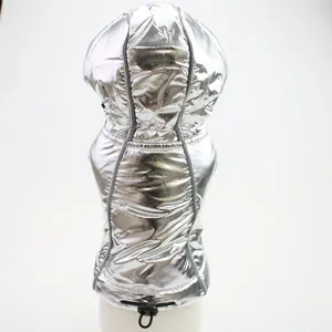 Detailed back view of a silver metallic hooded dog vest showing its quilted texture