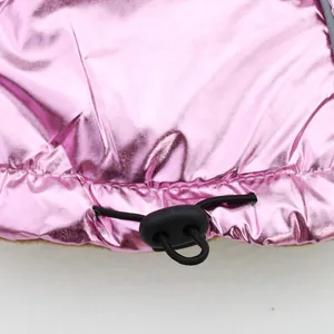 Close-up detail of pink metallic pet vest showing adjustable black drawstring toggle