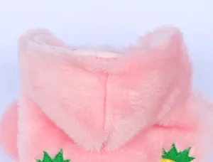Close-up of a pink furry pet hoodie showing the soft plush texture and hood detail