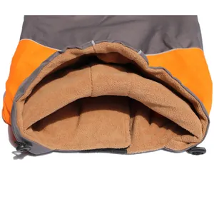 Macro view of warm fleece lining and adjustable toggle on outdoor dog jacket detail