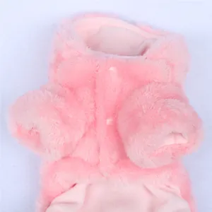 Close-up of pink plush pet jacket detail showing soft faux fur texture for small dogs