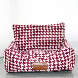Detailed view of the red and white houndstooth pattern on this cozy pet sofa bed