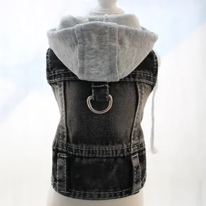 Close-up of a stylish dog denim hoodie vest featuring a metal leash D-ring attachment