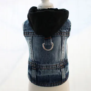 Macro view of pet denim vest showing the sturdy silver metal D-ring for leash attachment