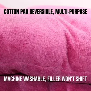 Close-up of pink plush pet mat showing soft machine-washable fabric texture.