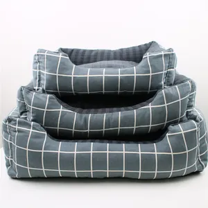 Set of three blue grid pattern pet beds in small, medium, and large sizes