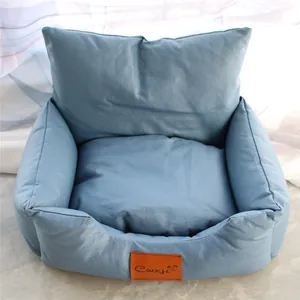 Soft blue faux leather pet sofa bed for small dogs and cats in cozy home setting