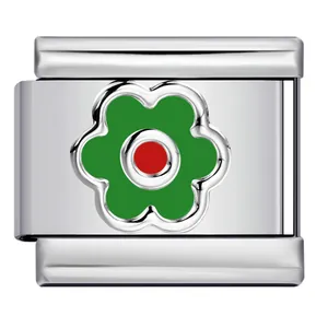 Close-up of Italian modular charm link featuring a green and red enamel flower pattern