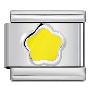 Detailed close-up view of a stainless steel Italian charm link with yellow enamel flower design