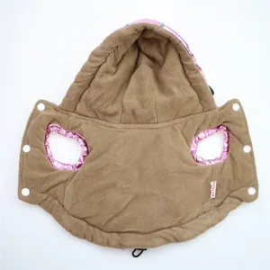 Detail view of pet hooded vest showing warm brown fleece lining and pink metallic shell