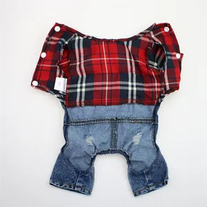 Back view detail of red plaid and denim pet overalls with snap buttons