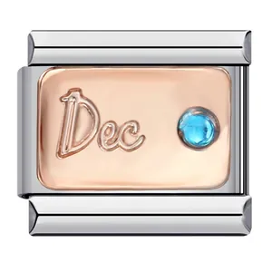 Italian modular charm in stainless steel with rose gold December Dec text and blue stone
