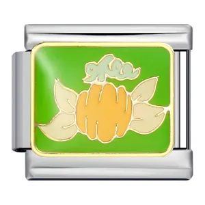 Close-up detail of Thanksgiving pumpkin enamel design on a stainless steel Italian charm