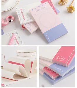 Detail of minimalist Korean style memo pads with daily planner and message sections
